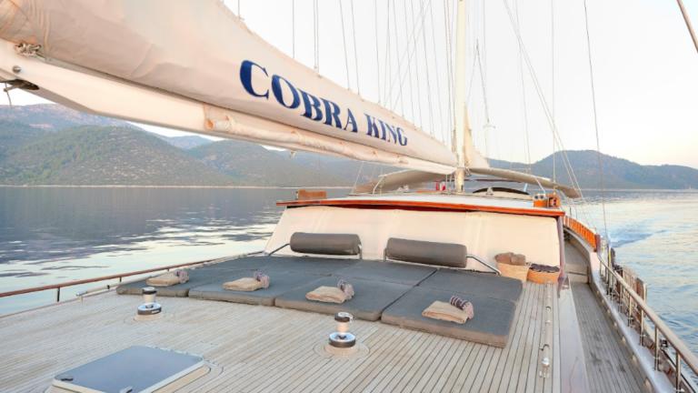 The upper deck of the Cobra King gulet. You can see the sun mattresses